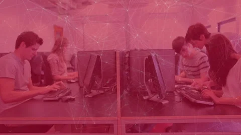 Instructor entering computer lab and guiding students typing with keystroke Stock Footage 316185762