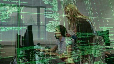 Instructor entering computer training and guiding student coding review with Stock Footage 314709701