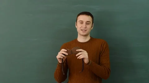 Instructor explains importance of using safety working glasses on manufacture. Stock Footage 68685412