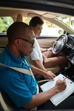 Instructor Filling Evaluation Checklist Stock Photos