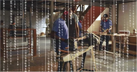 Instructor guiding apprentice mounting wood blank and shaping lathe piece during Stock-Footage 316184195