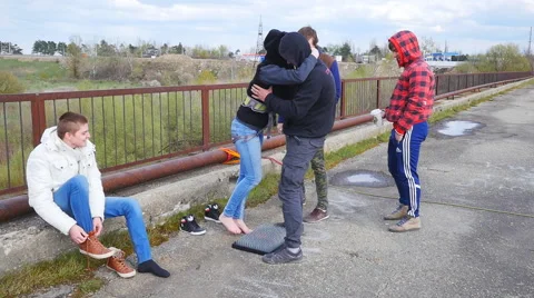 Instructor helping a girl get off the board with nails Stock Footage 68348451