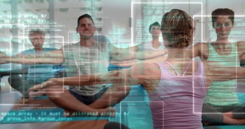 Instructor lifting hands activating code panels guiding students through tech Stock Footage 312826390