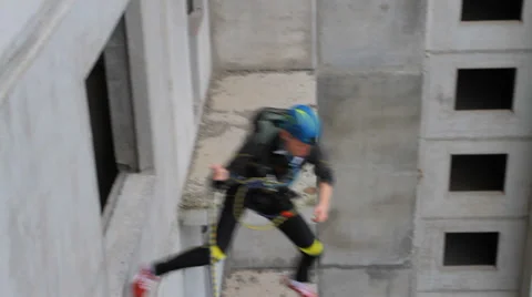 Instructor makes the first jump test, testing equipment spanned Stock Footage 33612113