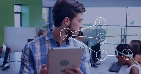 Instructor reading tablet in lab causing animated net map aligning nodes over Stock Footage 329910801
