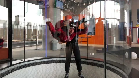 Instructor teaches indoor skydiving Stock-Footage 109322097