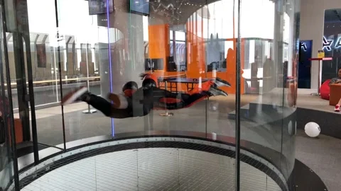 Instructor teaches indoor skydiving Stock-Footage 109322158