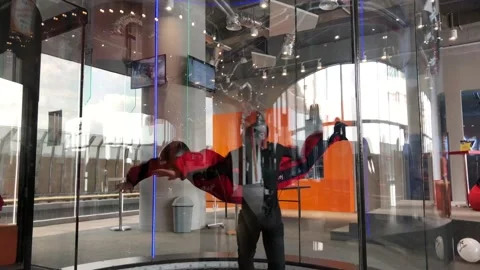 Instructor teaches indoor skydiving Stock-Footage 109322206