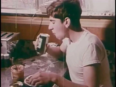 An instructor teaches the preliminary steps of gun safety, and a teenage boy Stock Footage 74886660