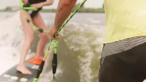 The instructor teaches you how to surf properly Stock Footage 158793588