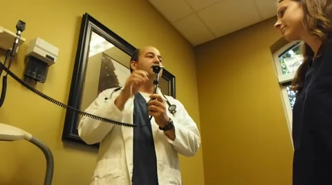 Instructor teaching student about medical equipment Stock Footage 56354299