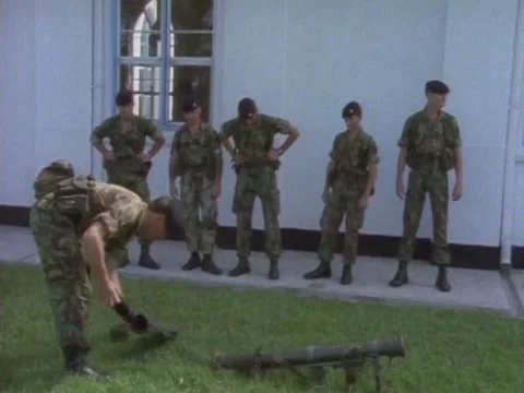 Instructor training military cadets with rocket Launcher Stock Footage 79877477