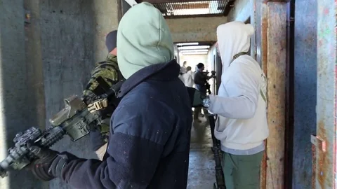 Instructor Works with Swat Team Trainee Stock Footage 70561623