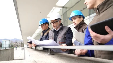 Instructor with young people in engineering training Stock Footage 86617143