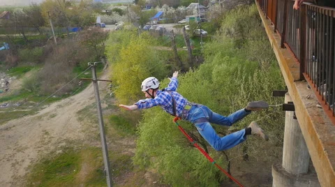 Instructors hardly help jump man to overcome fear Stock Footage 68349814