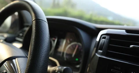 Instrument panel of a running car on highway Stock Footage 158343084