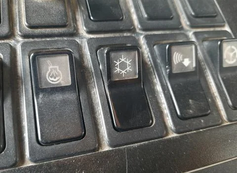 Instrument panel switch on the dashboard of a heavy equipment truck Foto stock