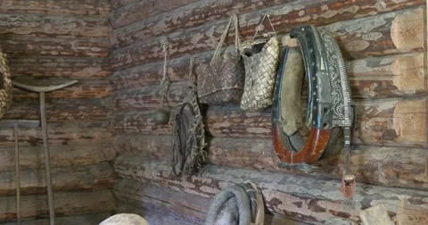 The instruments of production in the barn of a peasant. Household items. Stock Footage 64592192