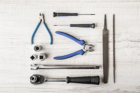 Instruments working on a wooden table Stock Photos