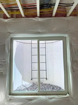 Insulated Basement with Framed Escape Window Stock Photos