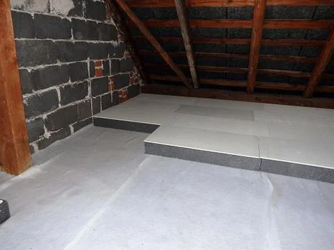 Insulation of the attic - polystyrene Stock Photos