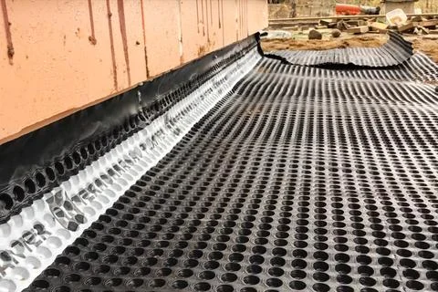 Insulation blind area of the building. Plastic rubber sealant. Stock Photos