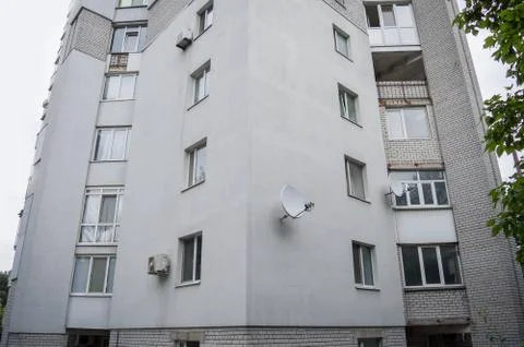 Insulation of the facade, multi-storey residential building against the sky Stock Photos