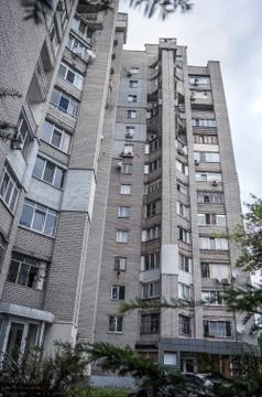 Insulation of the facade, multi-storey residential building against the sky Stock Photos