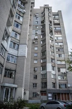 Insulation of the facade, multi-storey residential building against the sky Stock Photos