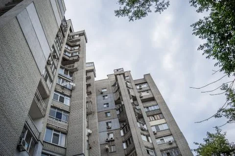 Insulation of the facade, multi-storey residential building against the sky Stock Photos