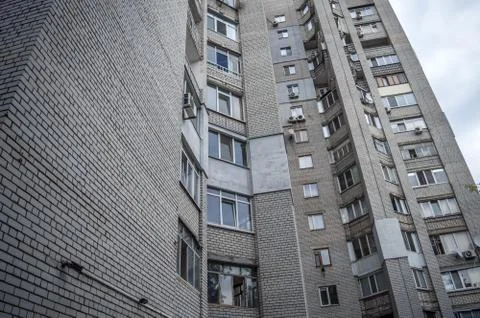 Insulation of the facade, multi-storey residential building against the sky Stock Photos