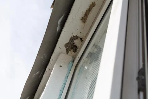 Insulation of the facade of a panel house with foam plastic. Selective focu.. Foto stock