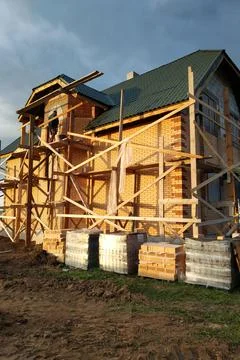 Insulation of the house with facade bricks, construction of a new house and s 스톡 사진