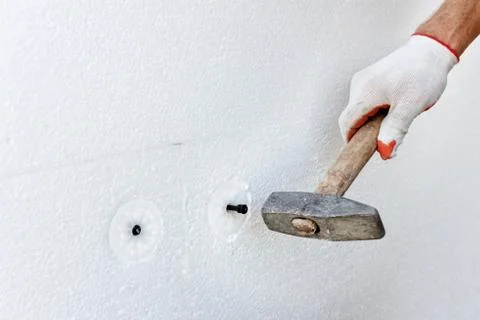 Insulation of the house with polyfoam. Stock Photos