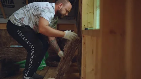 Insulation laying, installation of insulation in the house Video stock 343095713