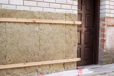 Insulation outdoor brick wall Stock Photos