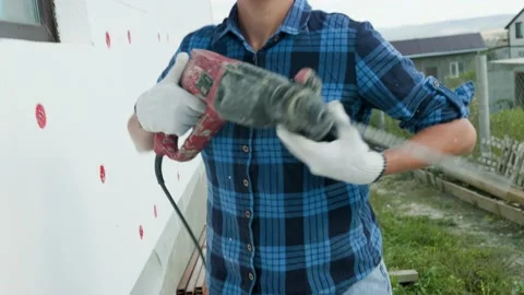 Insulation of the walls of the house with foam. Stock Footage 208911399
