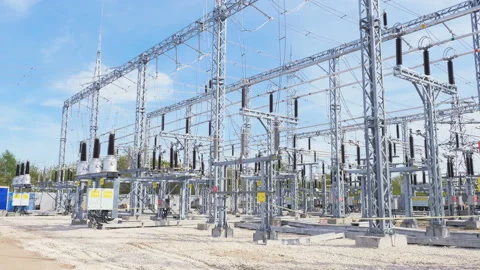 Insulators isolate current-carrying parts at substation Stock Footage 90475894