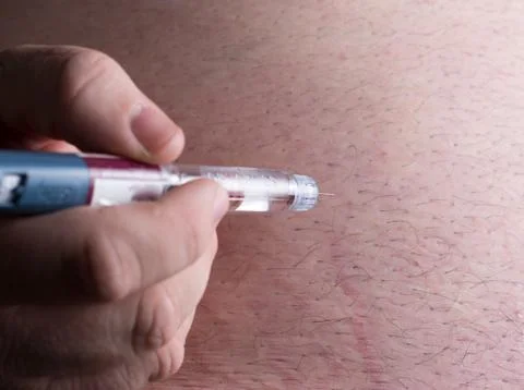Insulin being injected Stock Photos
