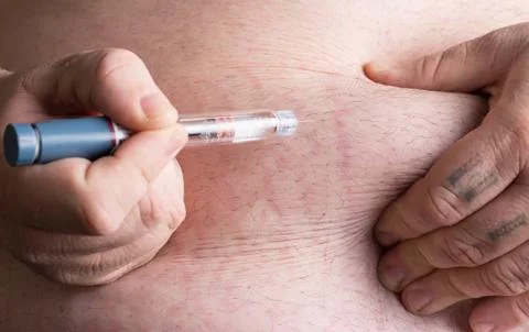 Insulin being injected Stock Photos