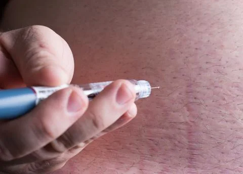 Insulin being injected Stock Photos