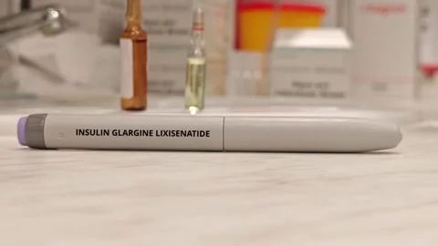 INSULIN GLARGINE LIXISENATIDE fixed-ratio insulin and GLP-1 receptor agonist Stock Footage 341982304