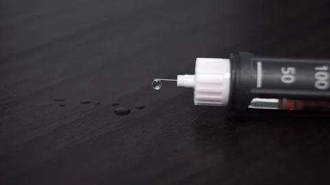 Insulin injection, needle, 1 unit of insulin Stock Footage 73545972