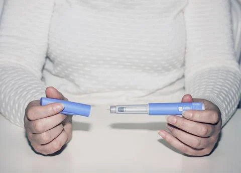 Insulin injection pen or insulin cartridge pen for diabetics. Stock Photos