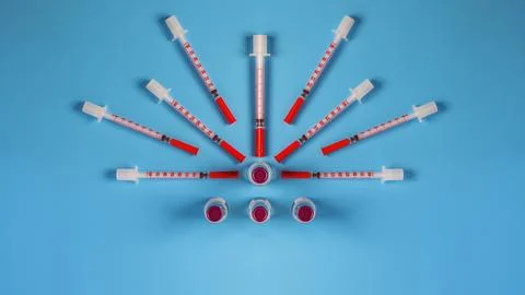 Insulin injection syringe arrayed around a insulin injection solution in ,in  Foto stock