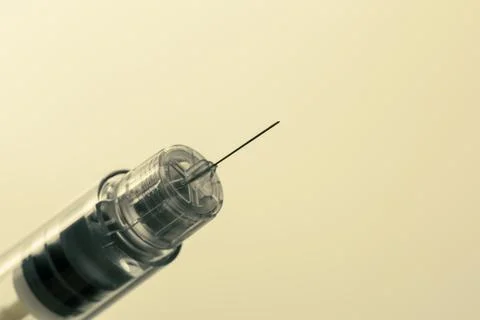 Insulin pen needle, threaded to attach securely and safely to insulin pen, so Stock Photos