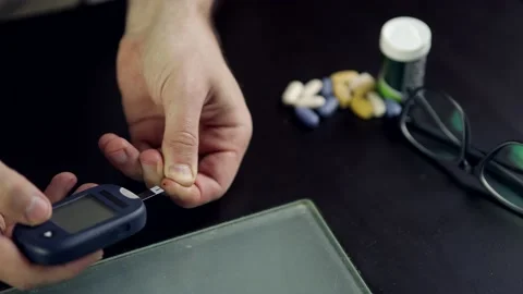 Insulin Resistance Test Strip Glucometer. Diabetes Measures Blood Glucose Stock Footage 236192964