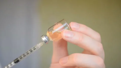 Insulin syringe close-up Stock Footage 121221019