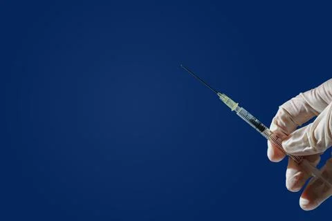 Insulin syringe in hand Stock Photos