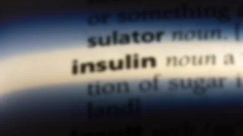 Insulin word in a dictionary. Stock Footage 99561389